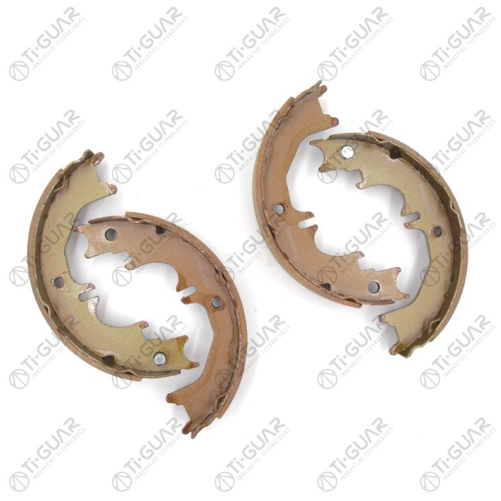 Тормозные колодки (КОМПЛЕКТ 4шт/РУЧНОГО ТОРМОЗА) TG-46580-60060/FN0642* Ti·GUAR