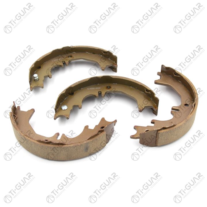 Тормозные колодки (КОМПЛЕКТ 4шт/РУЧНОГО ТОРМОЗА) TG-46580-60060/FN0642* Ti·GUAR